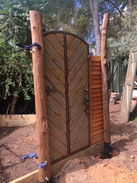 old shutters and doors clamped in place