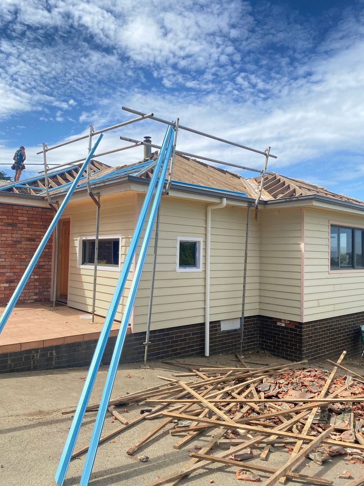 roof going on, massive cleanup starts