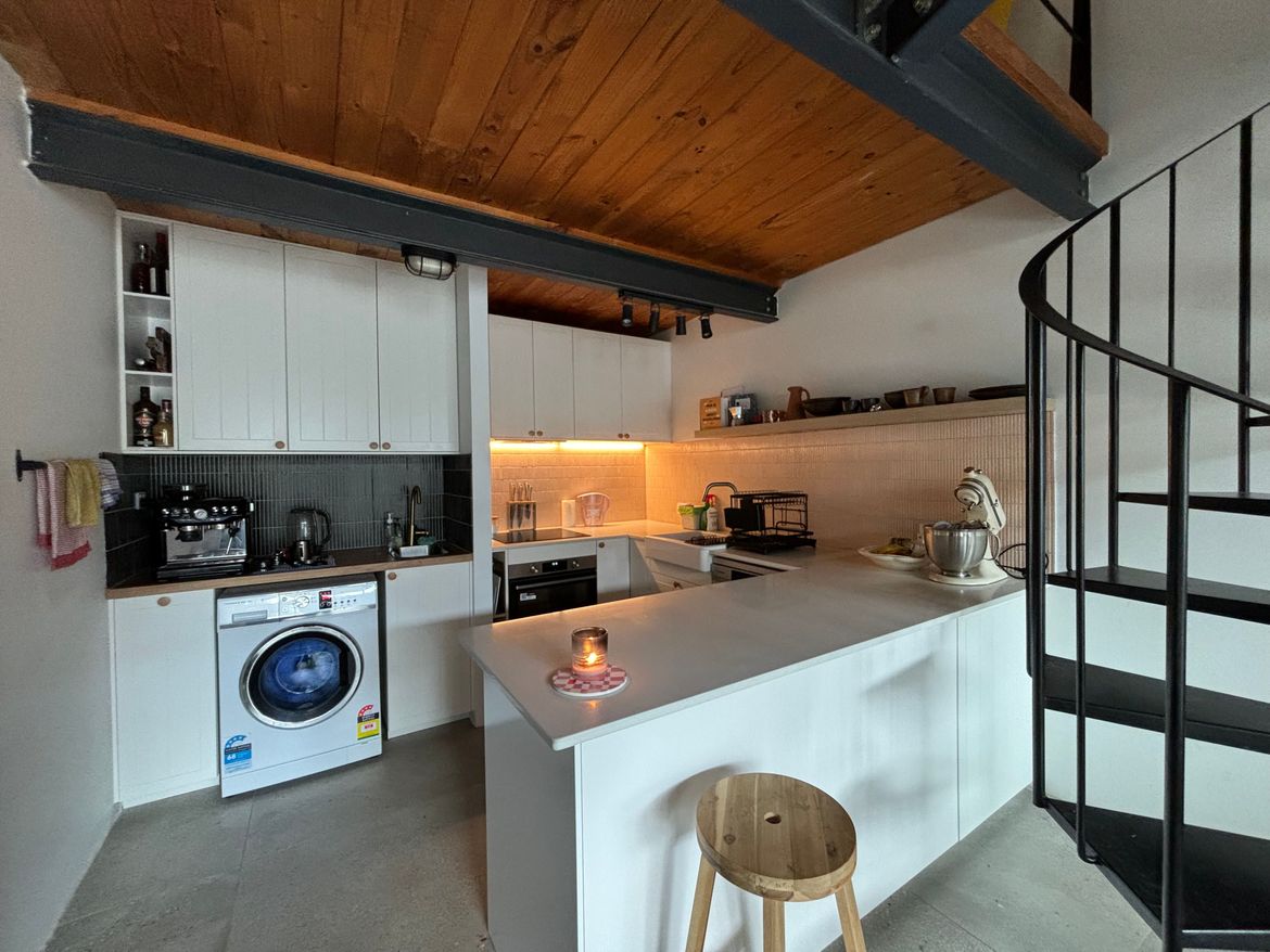 After kitchen makeover - new kitchen, new laundry and new polished concrete floors.