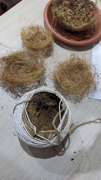 to get the perfect birds nest shape I pressed the husk into this coconut hanger I have!