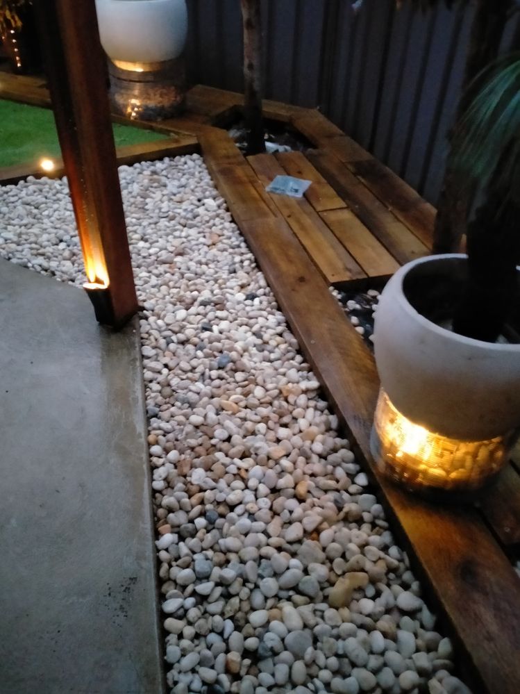 Pebbles in lights look good mounted in sleepers and aluminium off cuts I used to mount at base of posts