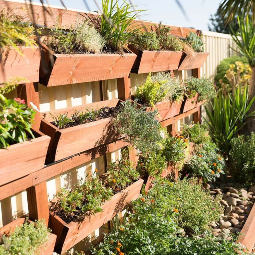 Vertical garden with built-in watering system.png