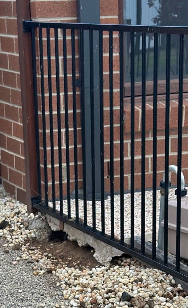 The Gap between concrete below fence and ground. I want to close the gap to avoid any animal going there or so.