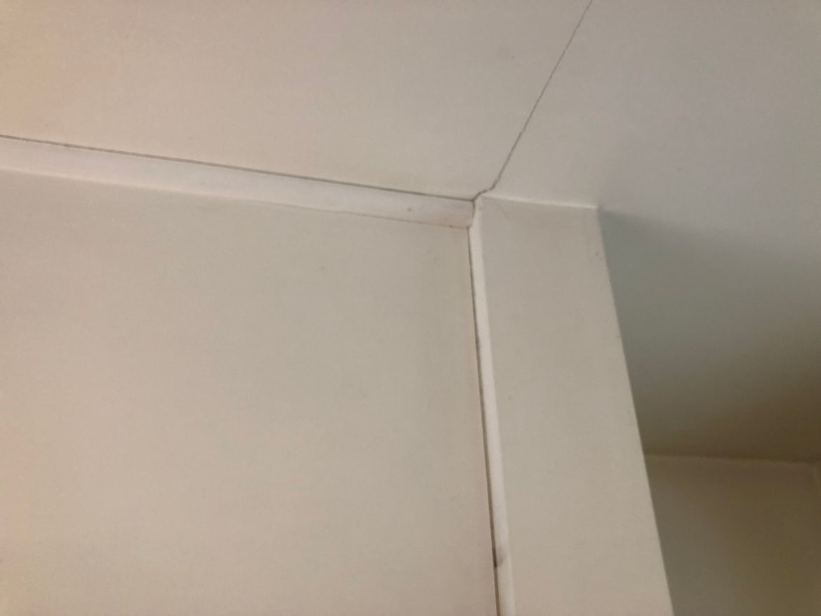 Cracks where ceiling meets wall