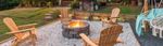 Outdoor fire pit area with hanging chairs.jpeg