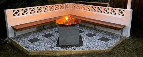 Backyard fire pit with bench seating.jpeg