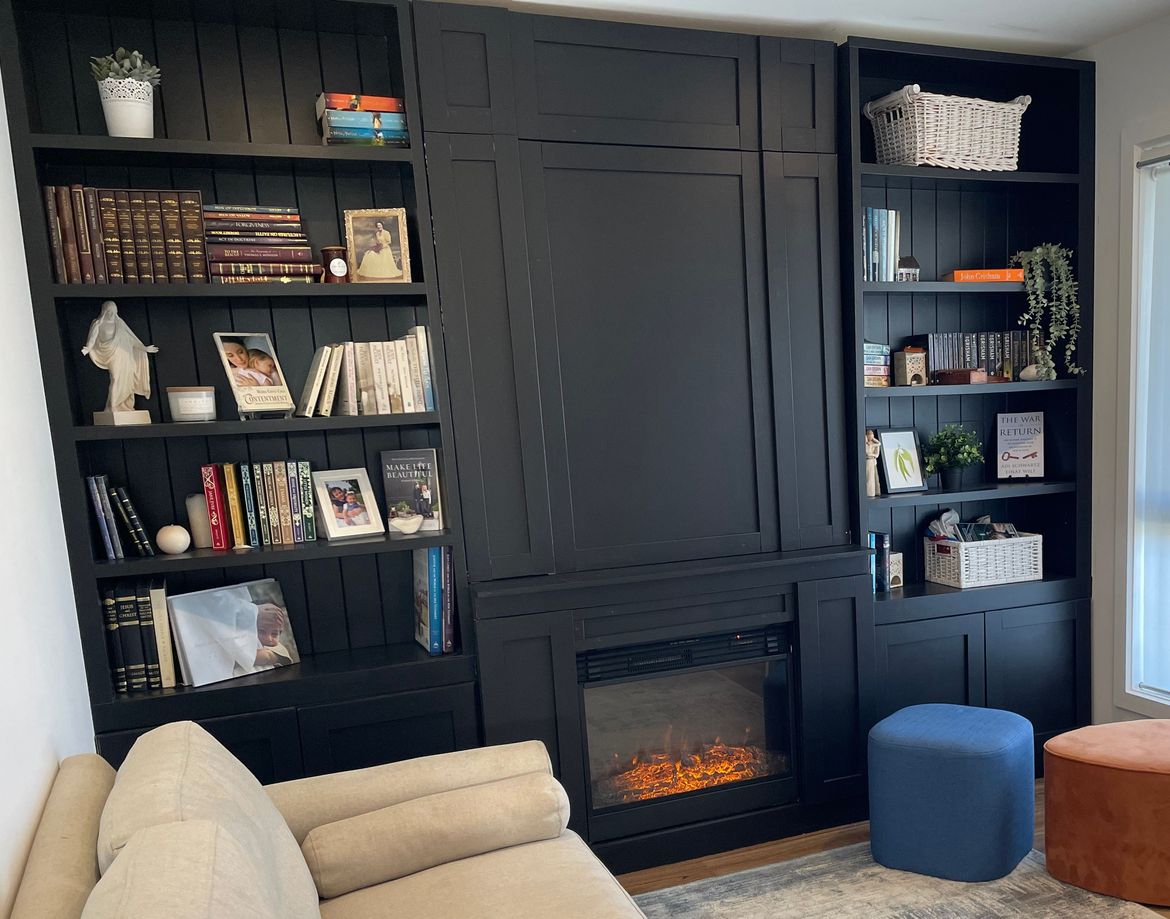 Bookcases turned into fireplace.JPG