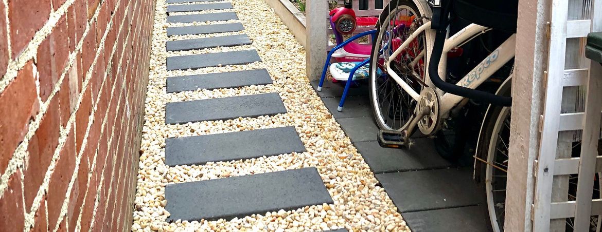 Side yard paving and bike shelter.jpg