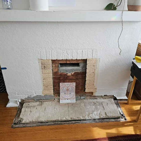 Fireplace (showing the 'letterbox' hold in the bricks