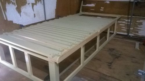 I built a single bed base with the sliding top following Deep Red's instructions