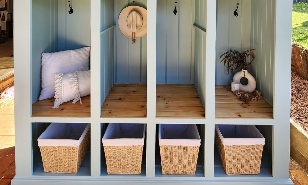 Upcycled entertainment unit as mud room.jpg