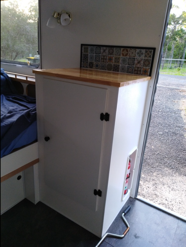 Skinned and fire extinguisher bay added with Hevea Benchtop from Bunnings