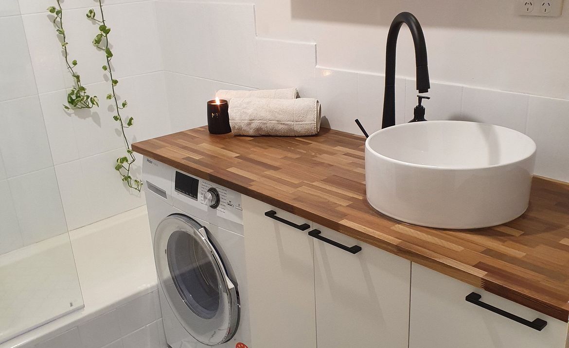 Bathroom refresh with large timber benchtop.jpg