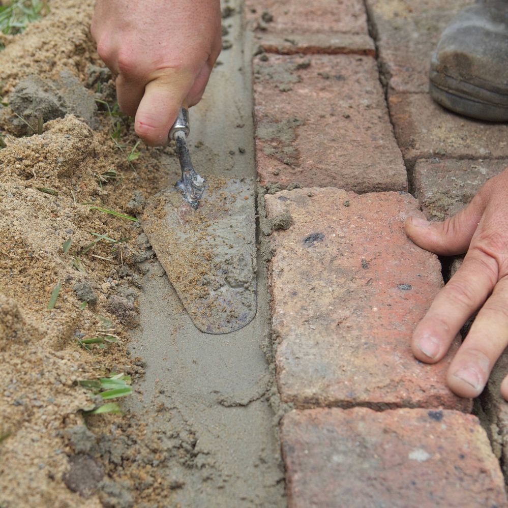 10. Use a trowel to pack concrete firmly.jpg