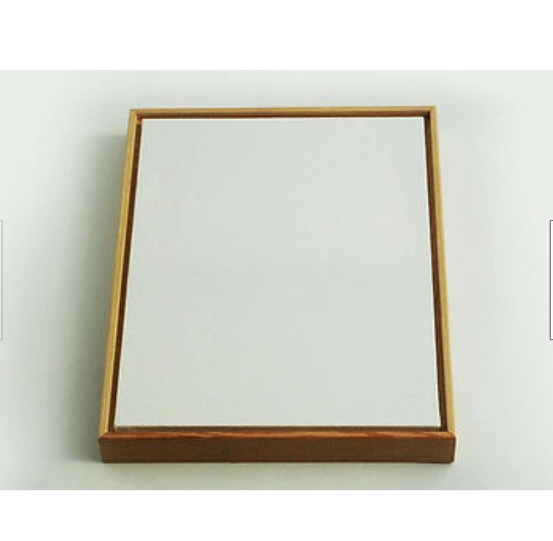 canvas in wood frame