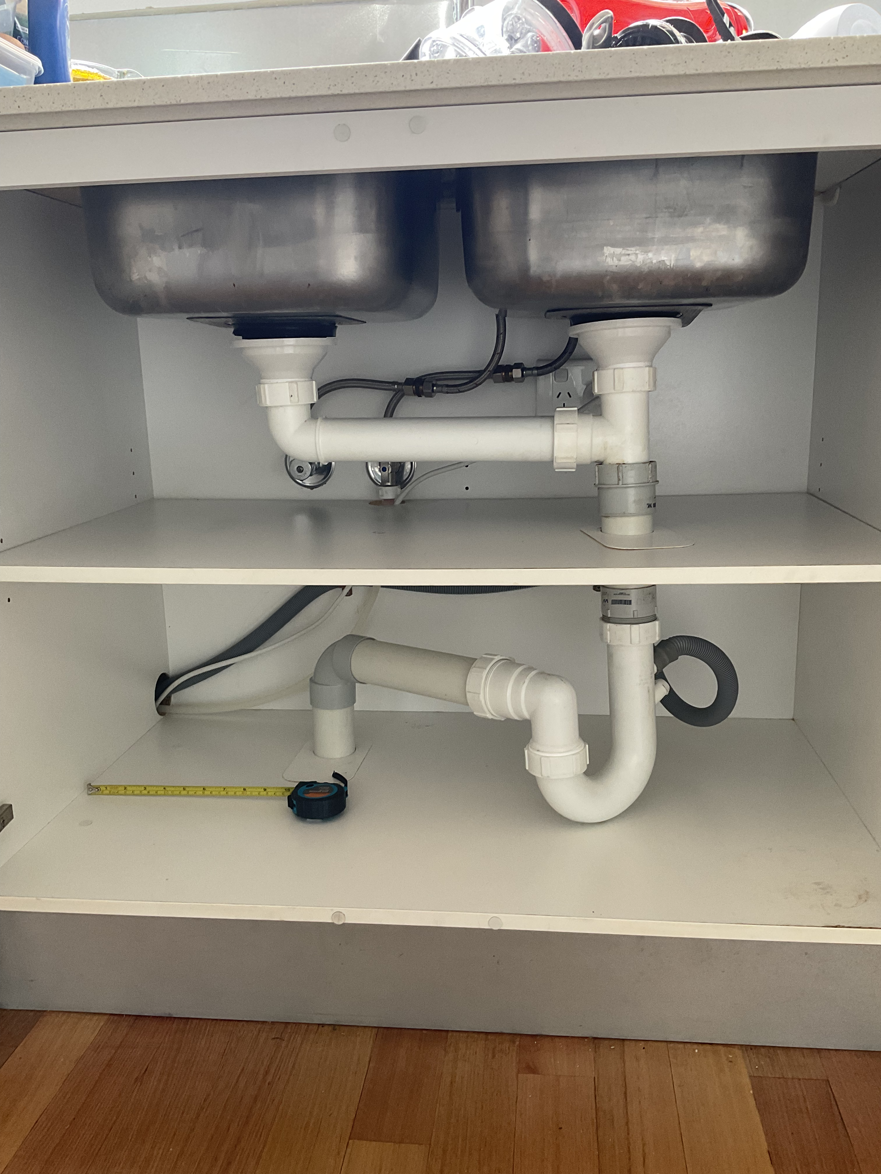 Look! Under-Sink Storage that Fits Around the Pipes