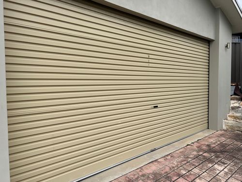 How to Paint a Garage Door Using a Paint Sprayer