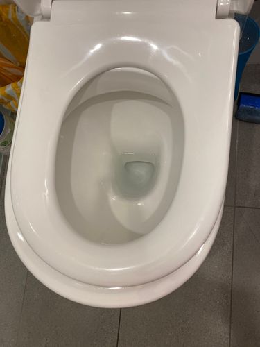 Fitted store toilet seat