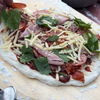 6. Stretch the dough and add toppings.png