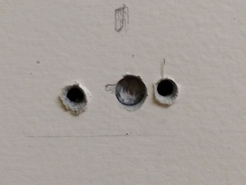 How to drill a store hole in a wall