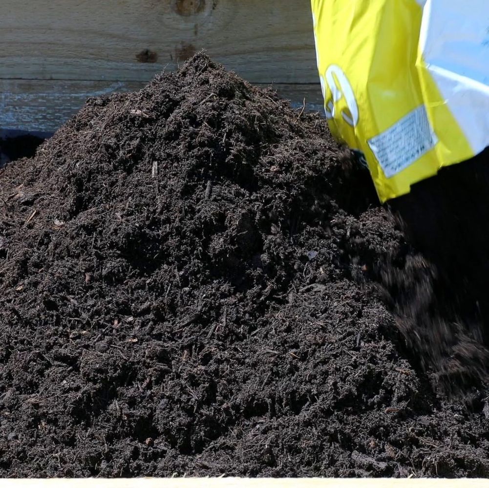 Step 15.2 Fill bed with soil and compost.jpg