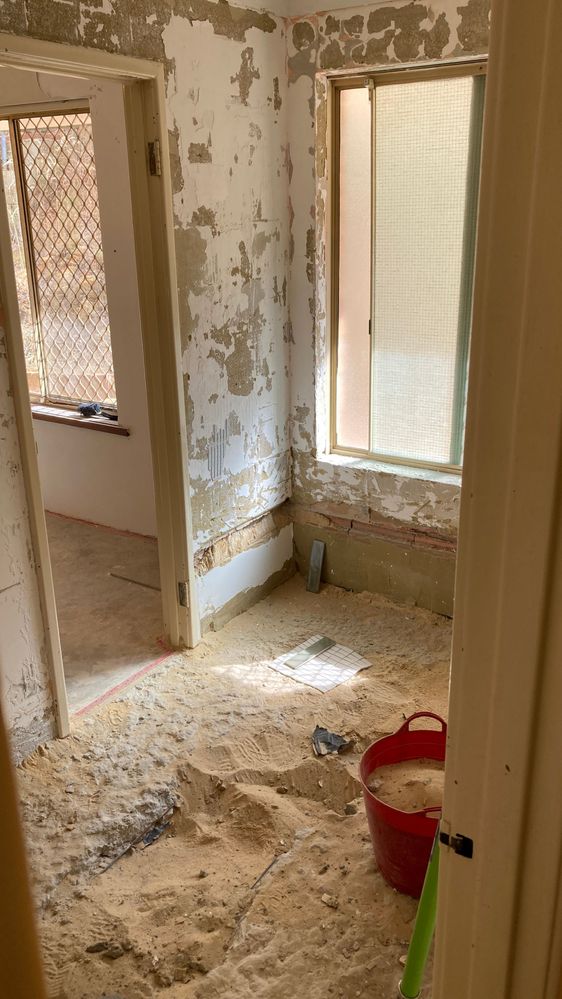 Bathroom floor showing channel to shower