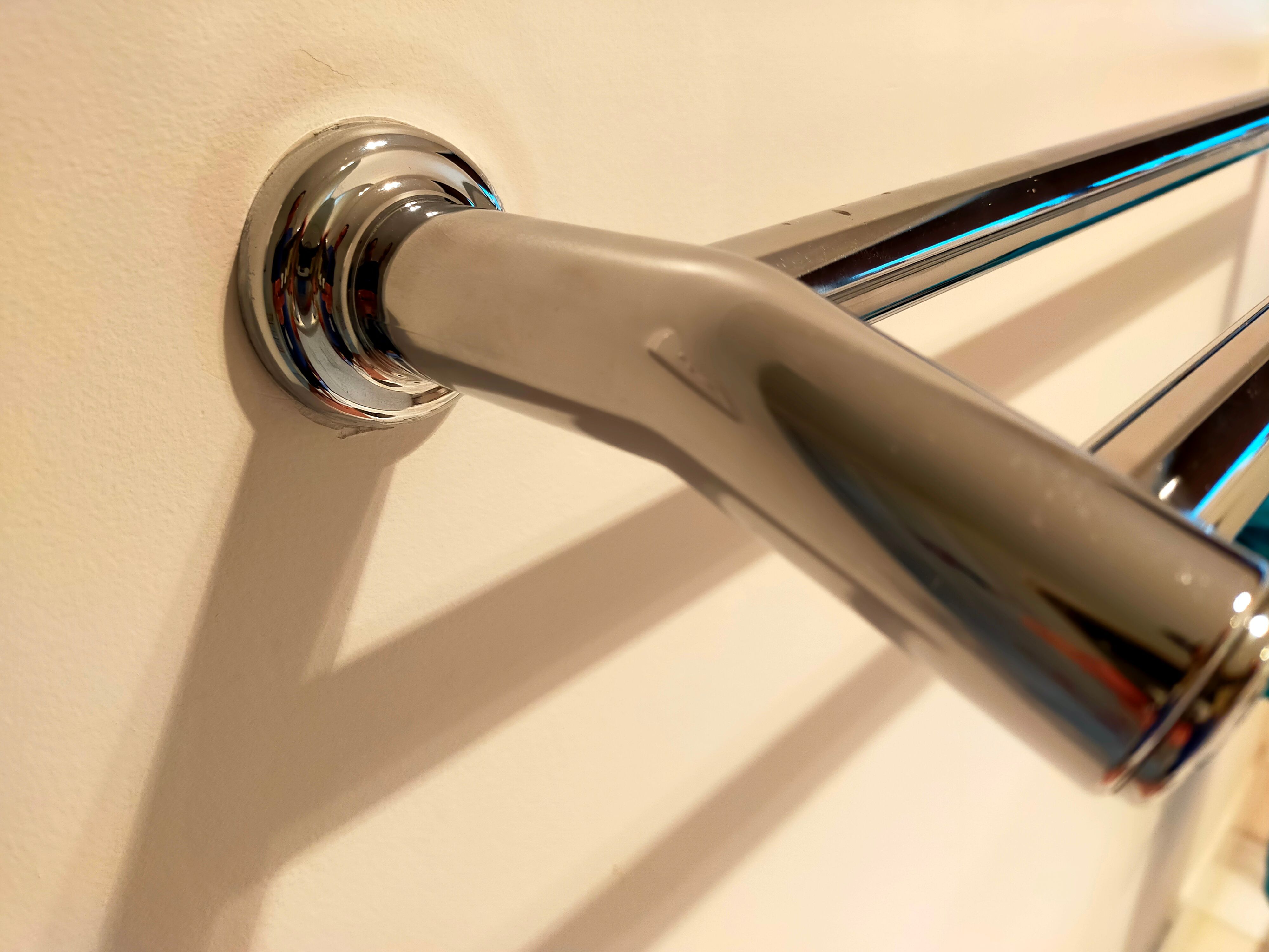 How to fix the bathroom towel holder