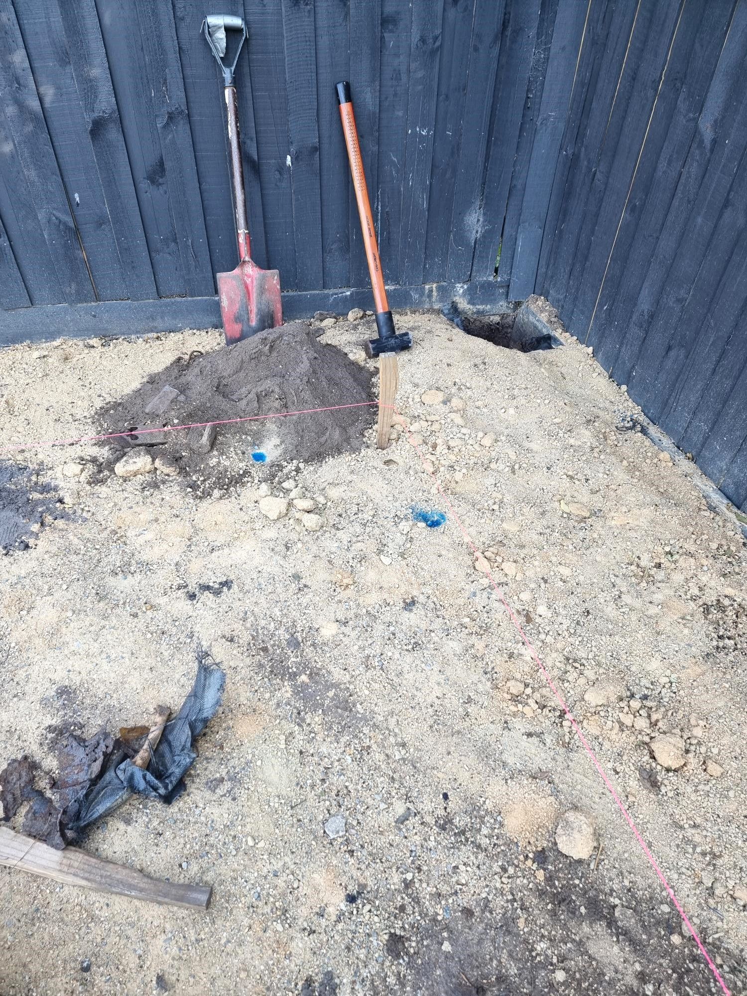 Firepit area with planter box and bench