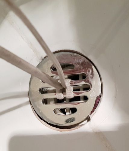 How to Remove a Shower Drain Cover